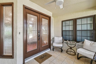Step into Florida living at its finest with this beautifully on Highland Lakes Executive Golf Course in Florida - for sale on GolfHomes.com, golf home, golf lot