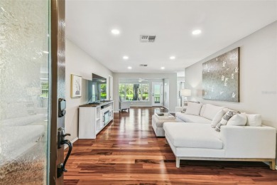 Step into Florida living at its finest with this beautifully on Highland Lakes Executive Golf Course in Florida - for sale on GolfHomes.com, golf home, golf lot