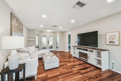 Step into Florida living at its finest with this beautifully on Highland Lakes Executive Golf Course in Florida - for sale on GolfHomes.com, golf home, golf lot