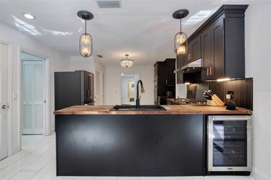 This extraordinary, designer-renovated 4-bedroom, 3-bath on Sugar Mill Country Club in Florida - for sale on GolfHomes.com, golf home, golf lot