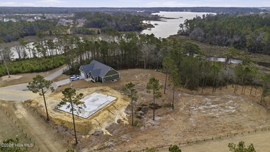 Experience elevated coastal living in this exceptional new on Silver Creek Golf Club in North Carolina - for sale on GolfHomes.com, golf home, golf lot