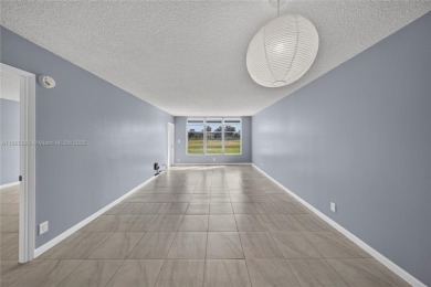 Thoughtfully updated with high-end finishes throughout, this on Palm-Aire Country Club and Resort - Palms in Florida - for sale on GolfHomes.com, golf home, golf lot