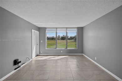 Thoughtfully updated with high-end finishes throughout, this on Palm-Aire Country Club and Resort - Palms in Florida - for sale on GolfHomes.com, golf home, golf lot