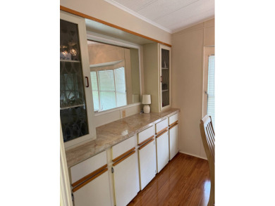 Priced to sell at $42,500 Monthly lot rent is $706 assumable on Pine Lakes Country Club in Florida - for sale on GolfHomes.com, golf home, golf lot
