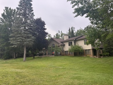 Enjoy golf course living in this comfortable 3 bed, 3 bath home on Michaywe Pines Course in Michigan - for sale on GolfHomes.com, golf home, golf lot