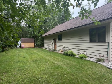 Enjoy golf course living in this comfortable 3 bed, 3 bath home on Michaywe Pines Course in Michigan - for sale on GolfHomes.com, golf home, golf lot