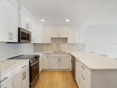 One or more photo(s) has been virtually staged. Resort-Style on Belleair Country Club in Florida - for sale on GolfHomes.com, golf home, golf lot