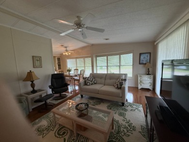 Priced to sell at $42,500 Monthly lot rent is $706 assumable on Pine Lakes Country Club in Florida - for sale on GolfHomes.com, golf home, golf lot