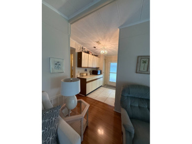 Priced to sell at $42,500 Monthly lot rent is $706 assumable on Pine Lakes Country Club in Florida - for sale on GolfHomes.com, golf home, golf lot