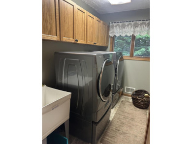 Enjoy golf course living in this comfortable 3 bed, 3 bath home on Michaywe Pines Course in Michigan - for sale on GolfHomes.com, golf home, golf lot