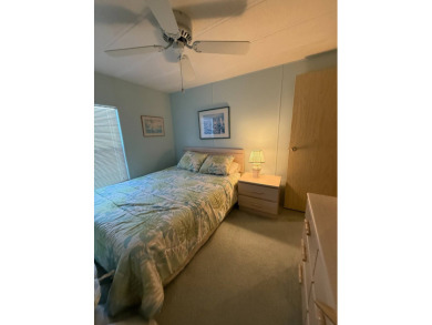 Priced to sell at $42,500 Monthly lot rent is $706 assumable on Pine Lakes Country Club in Florida - for sale on GolfHomes.com, golf home, golf lot