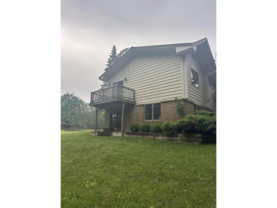 Enjoy golf course living in this comfortable 3 bed, 3 bath home on Michaywe Pines Course in Michigan - for sale on GolfHomes.com, golf home, golf lot