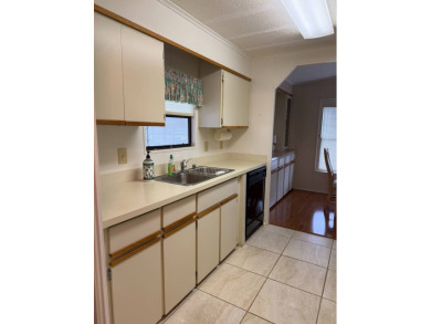 Priced to sell at $42,500 Monthly lot rent is $706 assumable on Pine Lakes Country Club in Florida - for sale on GolfHomes.com, golf home, golf lot