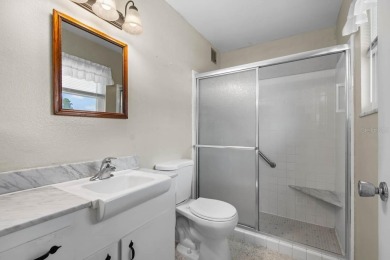 Adorable MOVE-IN READY 2-bedroom, 2-bathroom home with a POND on North Lakes Golf Course in Florida - for sale on GolfHomes.com, golf home, golf lot