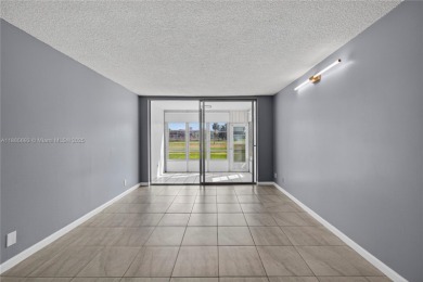 Thoughtfully updated with high-end finishes throughout, this on Palm-Aire Country Club and Resort - Palms in Florida - for sale on GolfHomes.com, golf home, golf lot
