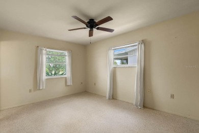 Adorable MOVE-IN READY 2-bedroom, 2-bathroom home with a POND on North Lakes Golf Course in Florida - for sale on GolfHomes.com, golf home, golf lot