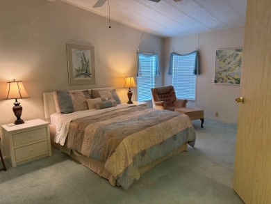 Priced to sell at $42,500 Monthly lot rent is $706 assumable on Pine Lakes Country Club in Florida - for sale on GolfHomes.com, golf home, golf lot