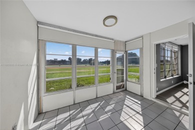 Thoughtfully updated with high-end finishes throughout, this on Palm-Aire Country Club and Resort - Palms in Florida - for sale on GolfHomes.com, golf home, golf lot