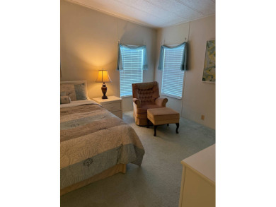 Priced to sell at $42,500 Monthly lot rent is $706 assumable on Pine Lakes Country Club in Florida - for sale on GolfHomes.com, golf home, golf lot
