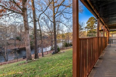 Row, row, row your boat! This home is a dream. Rayburn lakefront on Bella Vista Country Club - Berksdale in Arkansas - for sale on GolfHomes.com, golf home, golf lot