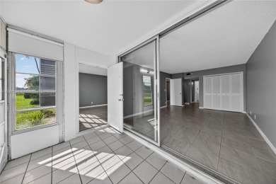 Thoughtfully updated with high-end finishes throughout, this on Palm-Aire Country Club and Resort - Palms in Florida - for sale on GolfHomes.com, golf home, golf lot