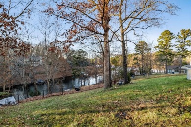 Row, row, row your boat! This home is a dream. Rayburn lakefront on Bella Vista Country Club - Berksdale in Arkansas - for sale on GolfHomes.com, golf home, golf lot