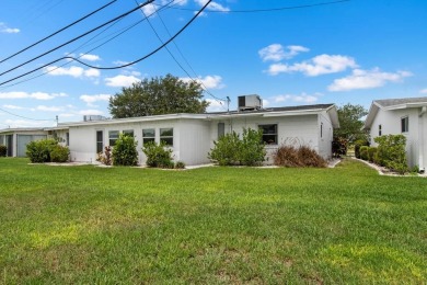 Adorable MOVE-IN READY 2-bedroom, 2-bathroom home with a POND on North Lakes Golf Course in Florida - for sale on GolfHomes.com, golf home, golf lot