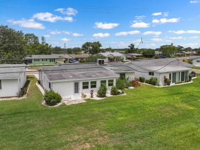 Adorable MOVE-IN READY 2-bedroom, 2-bathroom home with a POND on North Lakes Golf Course in Florida - for sale on GolfHomes.com, golf home, golf lot