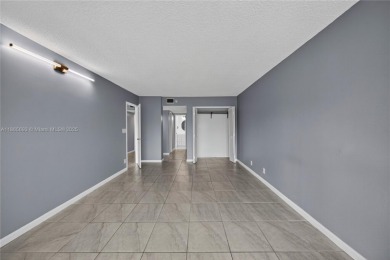 Thoughtfully updated with high-end finishes throughout, this on Palm-Aire Country Club and Resort - Palms in Florida - for sale on GolfHomes.com, golf home, golf lot
