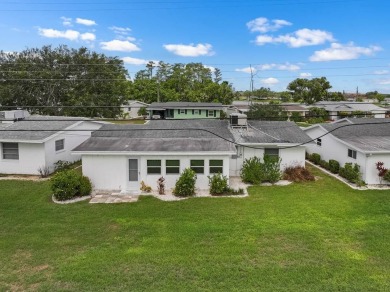 Adorable MOVE-IN READY 2-bedroom, 2-bathroom home with a POND on North Lakes Golf Course in Florida - for sale on GolfHomes.com, golf home, golf lot