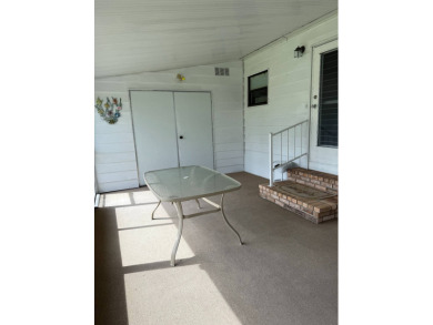 Priced to sell at $42,500 Monthly lot rent is $706 assumable on Pine Lakes Country Club in Florida - for sale on GolfHomes.com, golf home, golf lot