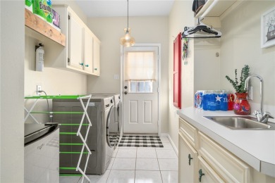 Situated within the prestigious Rockport Country Club, this on Rockport Country Club in Texas - for sale on GolfHomes.com, golf home, golf lot