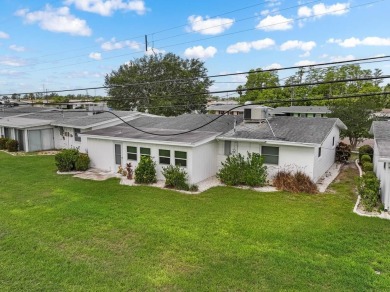 Adorable MOVE-IN READY 2-bedroom, 2-bathroom home with a POND on North Lakes Golf Course in Florida - for sale on GolfHomes.com, golf home, golf lot