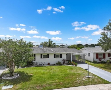 Adorable MOVE-IN READY 2-bedroom, 2-bathroom home with a POND on North Lakes Golf Course in Florida - for sale on GolfHomes.com, golf home, golf lot
