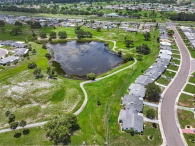 Adorable MOVE-IN READY 2-bedroom, 2-bathroom home with a POND on North Lakes Golf Course in Florida - for sale on GolfHomes.com, golf home, golf lot