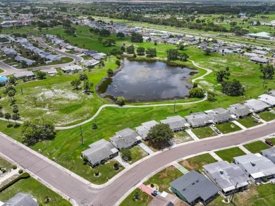 Adorable MOVE-IN READY 2-bedroom, 2-bathroom home with a POND on North Lakes Golf Course in Florida - for sale on GolfHomes.com, golf home, golf lot