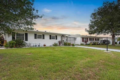 Adorable MOVE-IN READY 2-bedroom, 2-bathroom home with a POND on North Lakes Golf Course in Florida - for sale on GolfHomes.com, golf home, golf lot