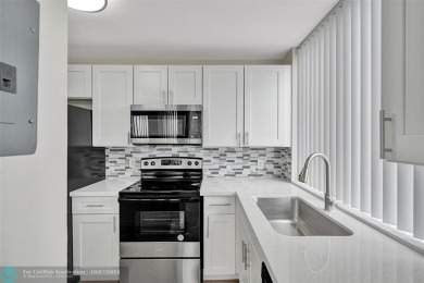 Fully renovated and updated 2 Bed, 2 Bath condo on the 8th floor on Inverrary Country Club in Florida - for sale on GolfHomes.com, golf home, golf lot