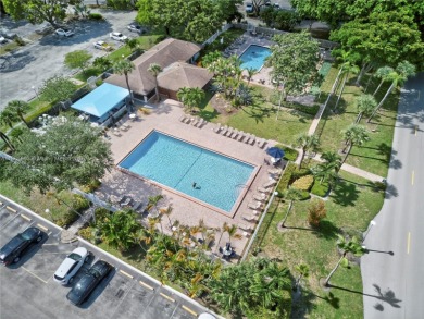 Thoughtfully updated with high-end finishes throughout, this on Palm-Aire Country Club and Resort - Palms in Florida - for sale on GolfHomes.com, golf home, golf lot
