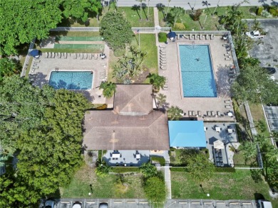 Thoughtfully updated with high-end finishes throughout, this on Palm-Aire Country Club and Resort - Palms in Florida - for sale on GolfHomes.com, golf home, golf lot