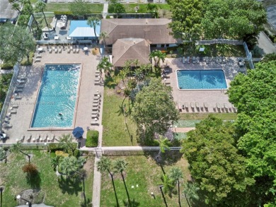 Thoughtfully updated with high-end finishes throughout, this on Palm-Aire Country Club and Resort - Palms in Florida - for sale on GolfHomes.com, golf home, golf lot