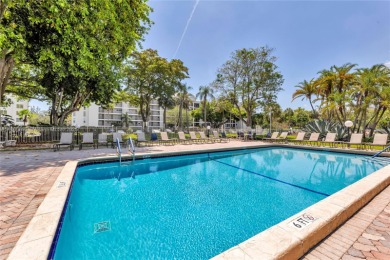 Thoughtfully updated with high-end finishes throughout, this on Palm-Aire Country Club and Resort - Palms in Florida - for sale on GolfHomes.com, golf home, golf lot