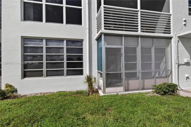 Thoughtfully updated with high-end finishes throughout, this on Palm-Aire Country Club and Resort - Palms in Florida - for sale on GolfHomes.com, golf home, golf lot