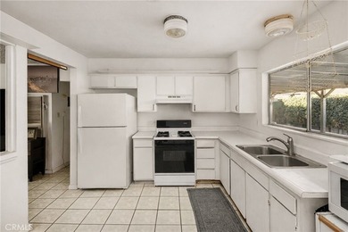 Excellent duplex opportunity in the desirable Westside Costa on Santa Ana Country Club in California - for sale on GolfHomes.com, golf home, golf lot