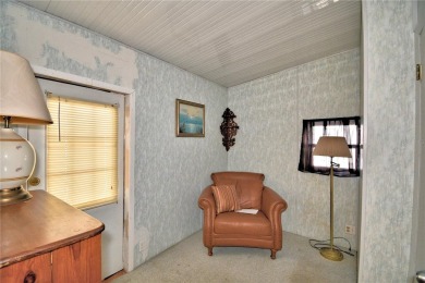 BEAUTIFUL FLORIDA OASIS located in a 55+ GATED community in the on Southern Dunes Golf and Country Club in Florida - for sale on GolfHomes.com, golf home, golf lot