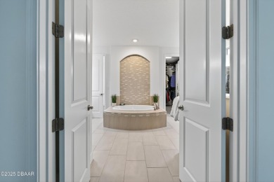 Gorgeous Customized Pool Home in Gated Golf Community - Loaded on Plantation Bay Golf and Country Club in Florida - for sale on GolfHomes.com, golf home, golf lot