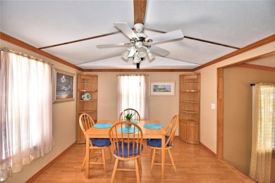 BEAUTIFUL FLORIDA OASIS located in a 55+ GATED community in the on Southern Dunes Golf and Country Club in Florida - for sale on GolfHomes.com, golf home, golf lot