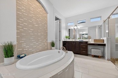 Gorgeous Customized Pool Home in Gated Golf Community - Loaded on Plantation Bay Golf and Country Club in Florida - for sale on GolfHomes.com, golf home, golf lot