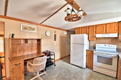BEAUTIFUL FLORIDA OASIS located in a 55+ GATED community in the on Southern Dunes Golf and Country Club in Florida - for sale on GolfHomes.com, golf home, golf lot