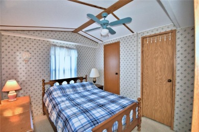 BEAUTIFUL FLORIDA OASIS located in a 55+ GATED community in the on Southern Dunes Golf and Country Club in Florida - for sale on GolfHomes.com, golf home, golf lot